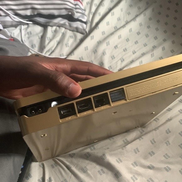 PS4 slim gold limited edition 2 controllers and cords. - Picture 3 of 3